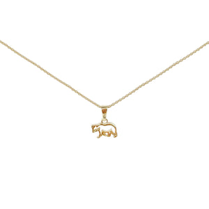 Gold plated polar bear pendant on gold plated necklace chain.