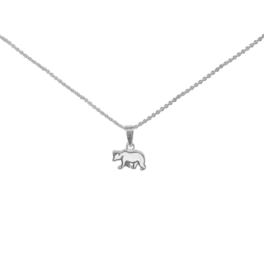 Sterling silver and white enamel polar bear pendant on silver necklace chain.