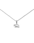 Sterling silver and white enamel polar bear pendant on silver necklace chain.