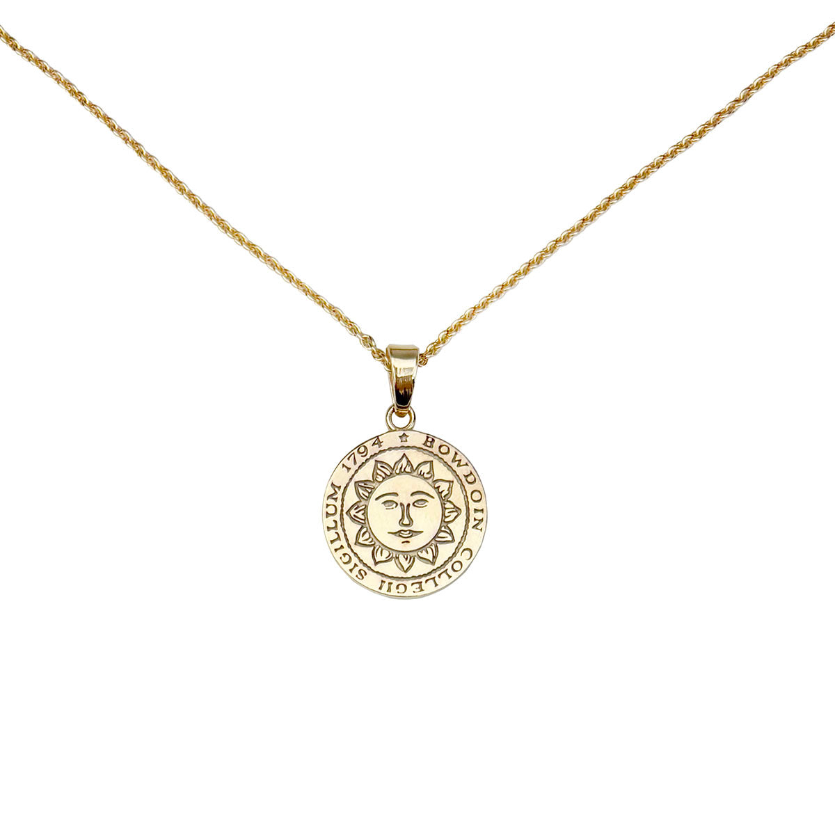 Gold necklace with Bowdoin College seal pendant.