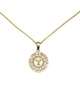 Gold necklace with Bowdoin College seal pendant.