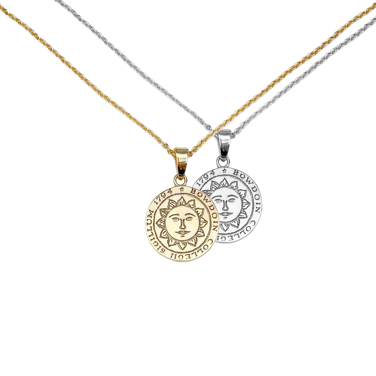 Gold and silver necklaces with Bowdoin seal medallion pendants.