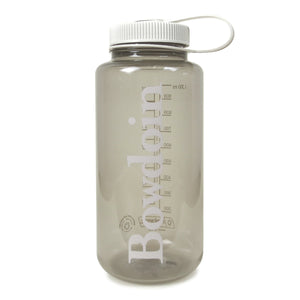 Cotton beige clear water bottle with light beige colored cap and wordmark imprint.