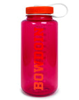 A translucent pink Nalgene water bottle with an orange cap and a white carrying loop, featuring the brand name 'BOWDOIN' printed vertically in orange on the front.
