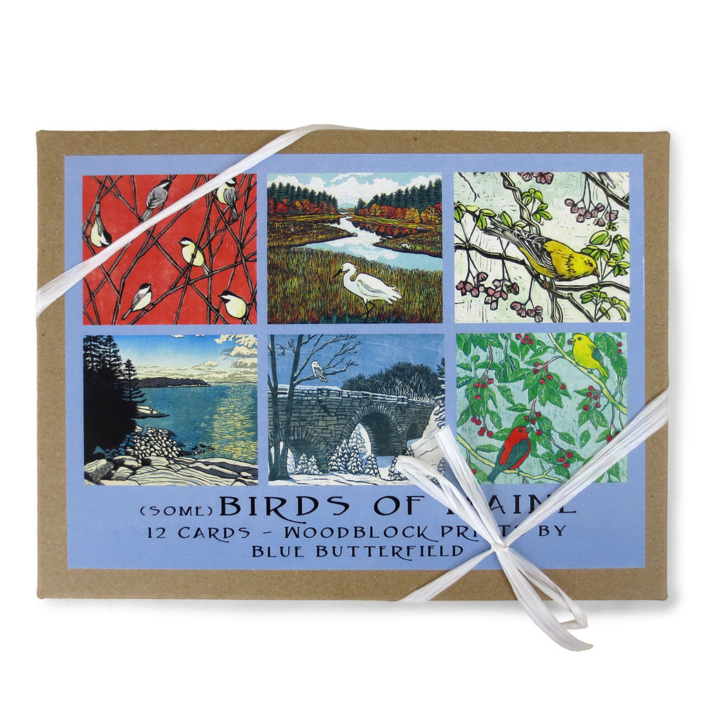 Craft paper box of cards with white paper ribbon featuring six designs of Maine bird woodcuts.