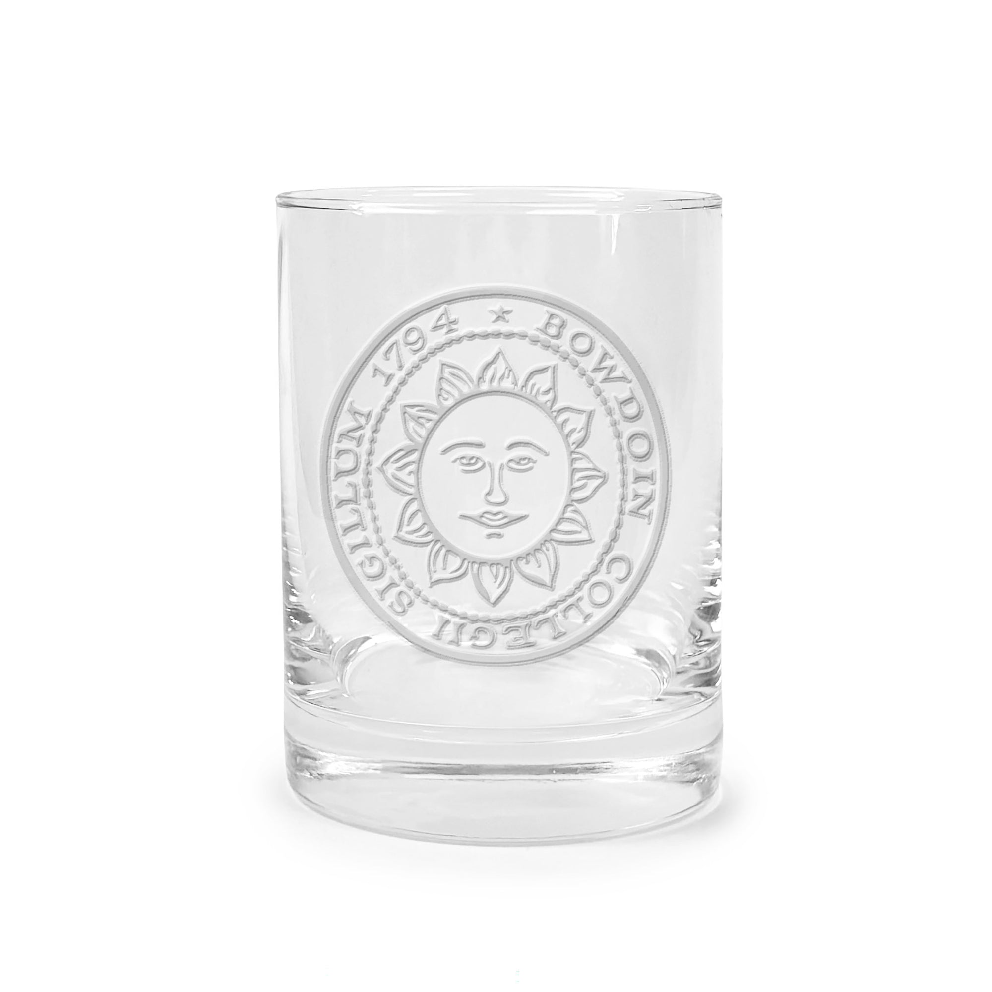 Clear glass tumbler with engraved Bowdoin College seal on a white background