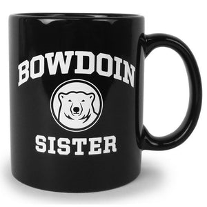 Black coffee mug with white imprint of BOWDOIN arched over a polar bear medallion over the word SISTER.