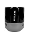Side view of black and grey coffee mug showing BOWDOIN branding.