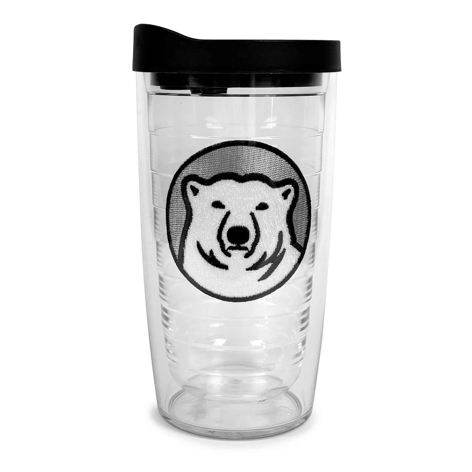 Clear tumbler with black lid featuring a polar bear design on a white background