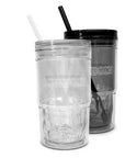 Two clear double-walled tumblers with lids and straws on a white background, one in transparent clear and one in dark gray, both featuring the Bowdoin logo.