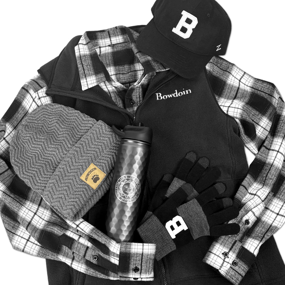 Assortment of Bowdoin-branded merchandise in wool, fleece, and flannel.