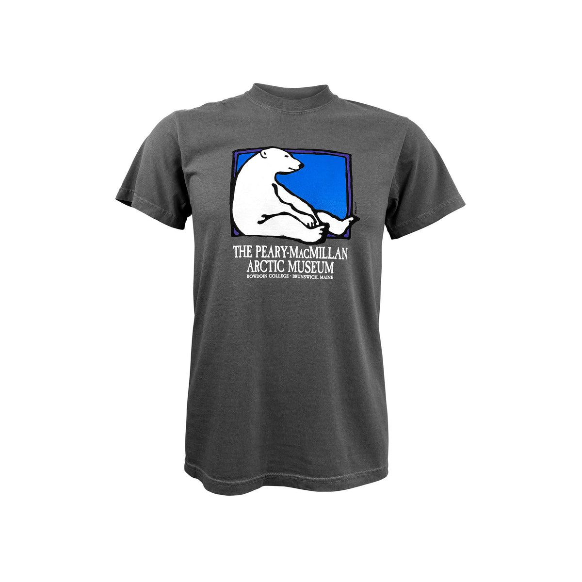 A dark gray short-sleeve t-shirt featuring a graphic of a polar bear sitting in a blue square with the text 'THE PEARY-MACMILLAN ARCTIC MUSEUM' printed on the front, set against a plain white background.