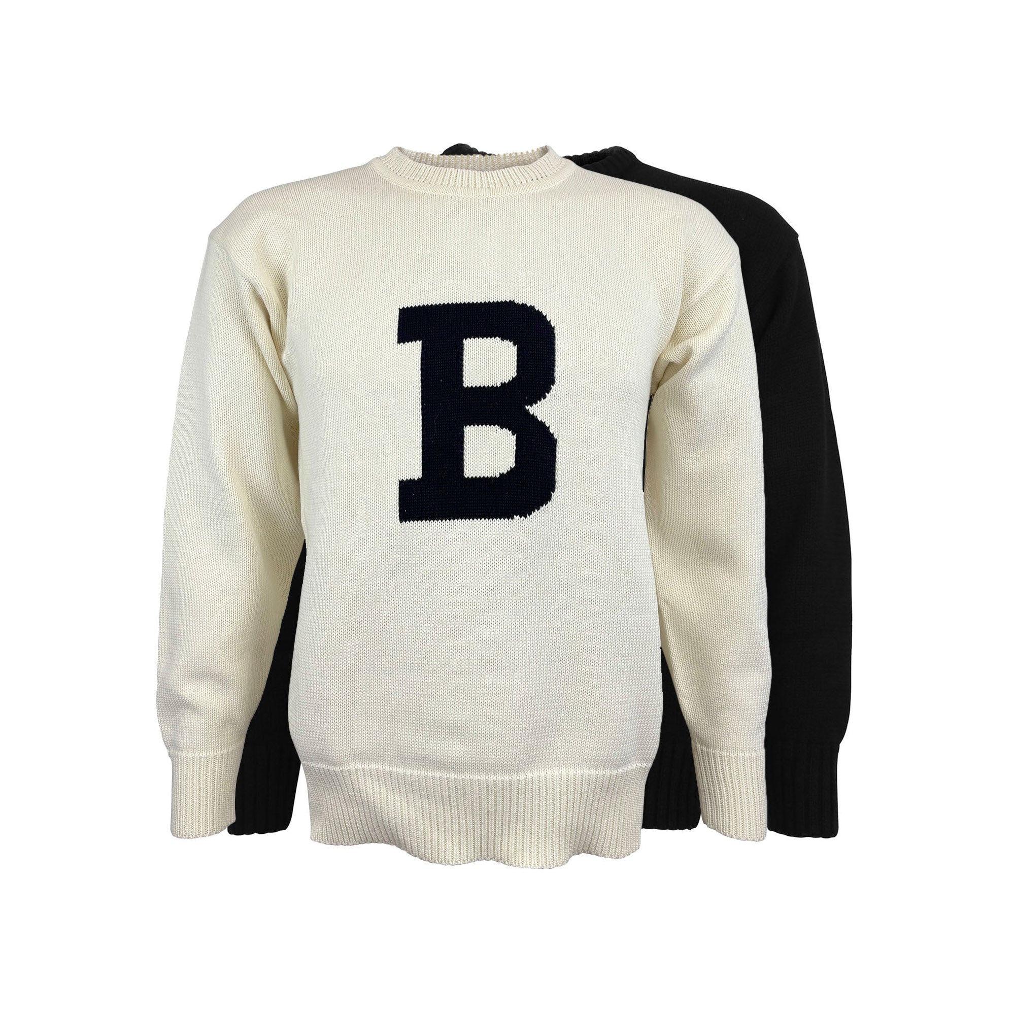 White sweater with black 'B' , and black sweater with white B on a white background