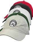 Five baseball caps in different colors with a bear logo on a white background