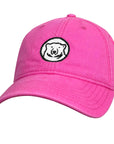 Pink cap with a bear logo on a white background