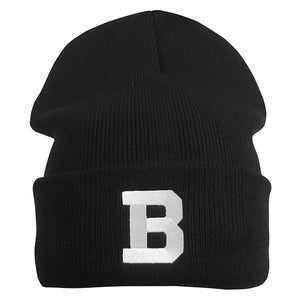 Black knit hat with embroidered white B on cuff.
