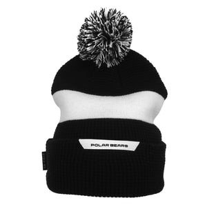 Black waffle-knit hat with white stripe and black and white pom. White patch with black POLAR BEARS on edge of cuff.