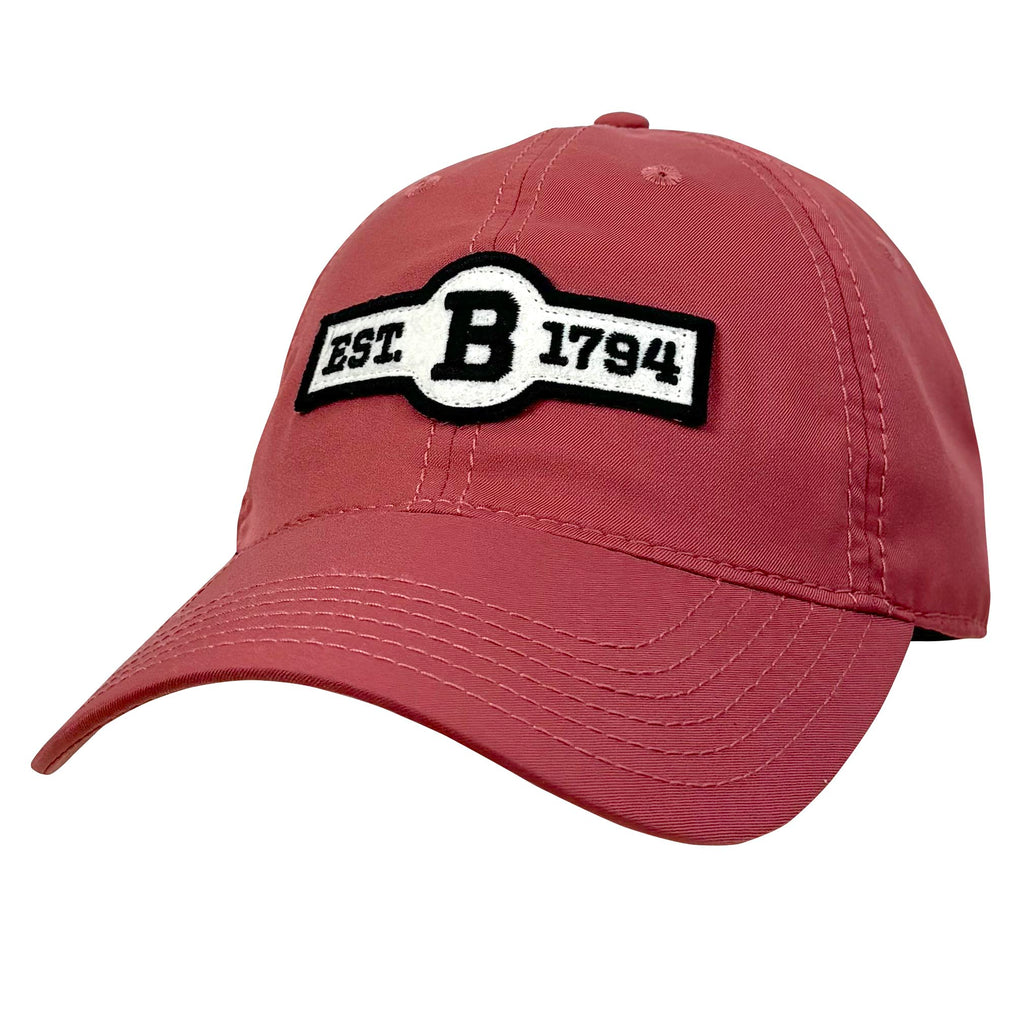 Nantucket red ballcap with front patch in ivory felt with black embroidery of EST. B 1794.