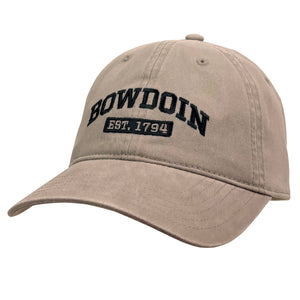 Khaki ball cap with black embroidery of BOWDOIN arched over a black rectangle with EST. 1794 embroidered inside in the same color as the hat.