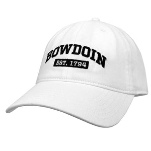 White ball cap with black embroidery of BOWDOIN arched over a black rectangle with EST. 1794 embroidered inside in the same color as the hat.