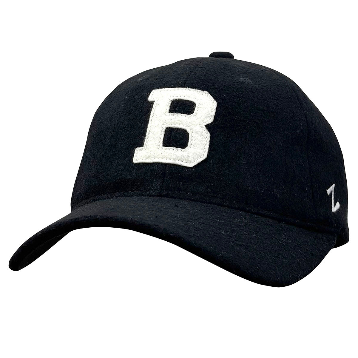 Black ball cap with cream B decoration on white background