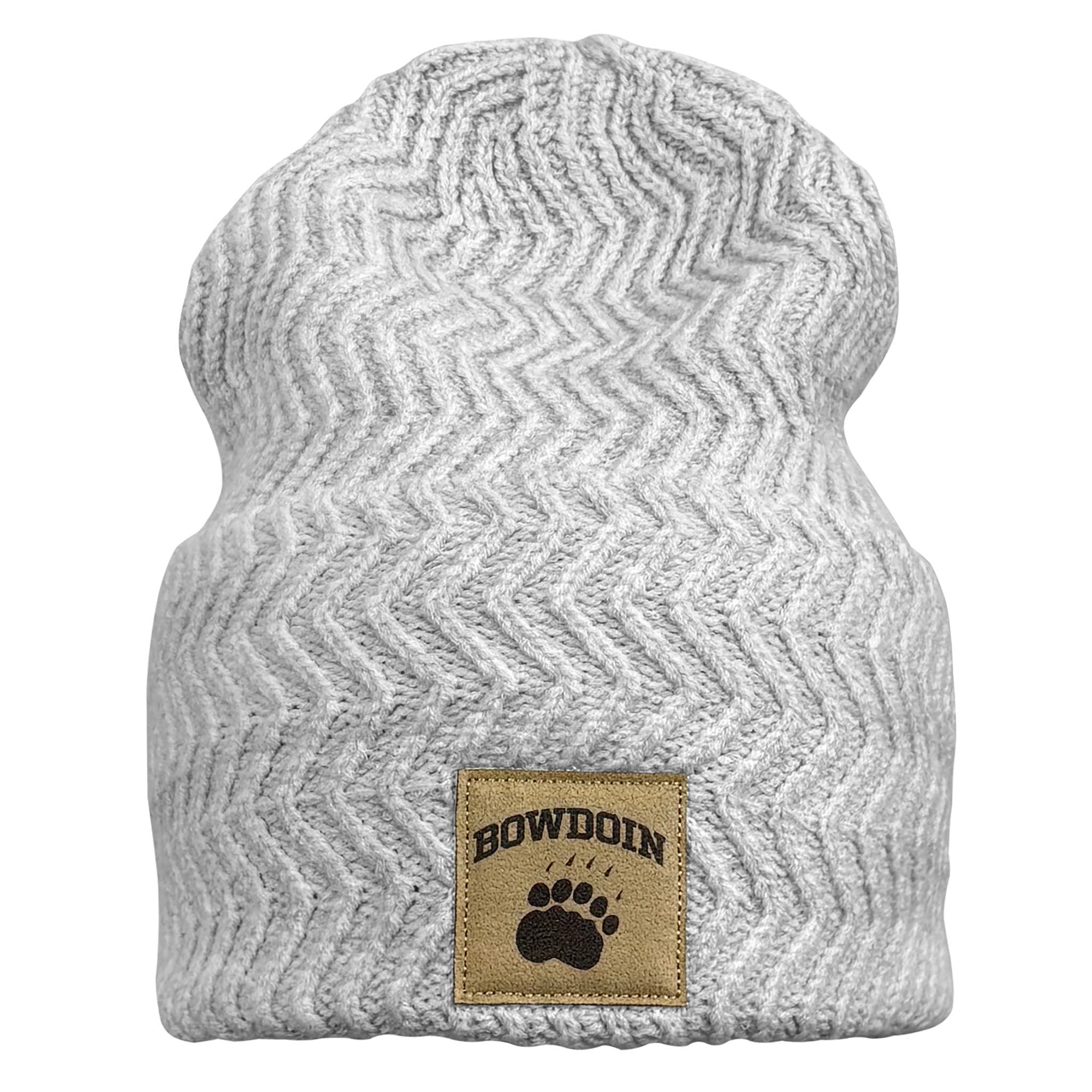 A light gray and white heathered knit beanie hat with a textured chevron pattern and a tan leather patch on the front featuring the 'BOWDOIN' brand name and paw print.