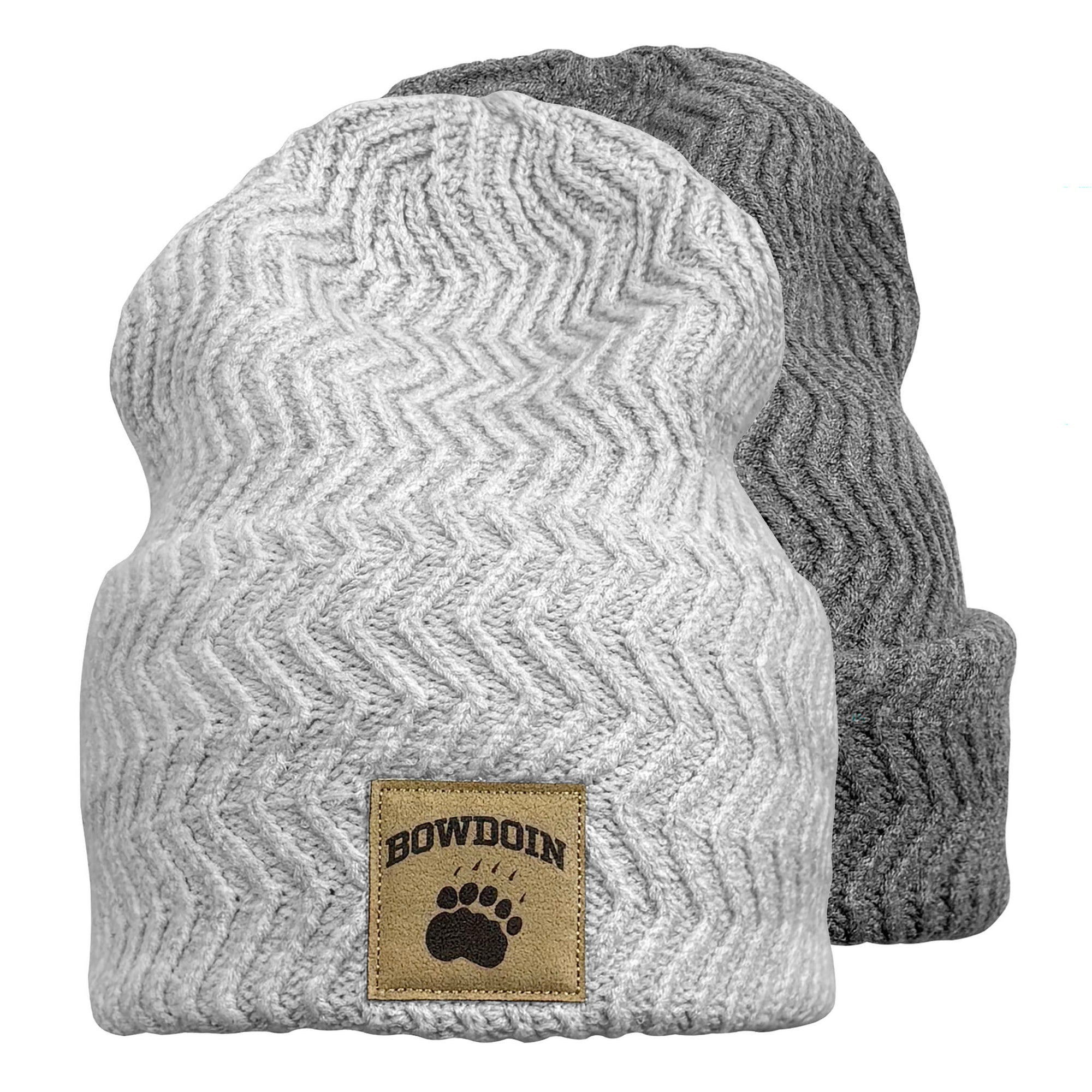 Two ribbed knit beanie hats shown on a white background, with a light heather gray one in front and a darker gray one behind. The front hat has a tan rectangular patch with the word "BOWDOIN" and a paw print.