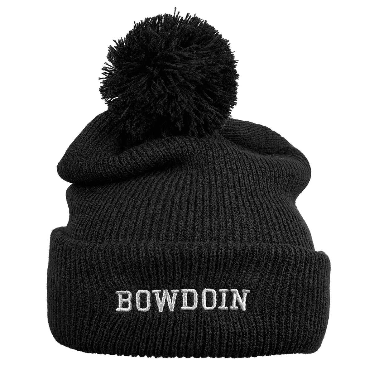 A black ribbed knit pom-pom beanie hat with the word 'BOWDOIN' embroidered in light gray on the front cuff, shown against a plain white background.