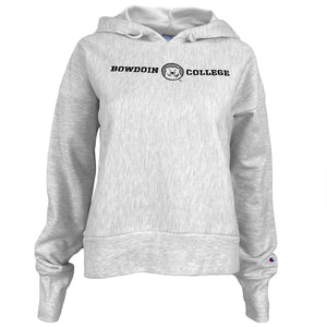 Silver grey oxford heather hooded cropped sweatshirt with embroidered Bowdoin College in black thread, and white, black, and grey mascot medallion embroidered between the two words.