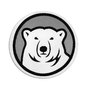 Round patch with white, black, and grey embroidery of Bowdoin polar bear mascot medallion.