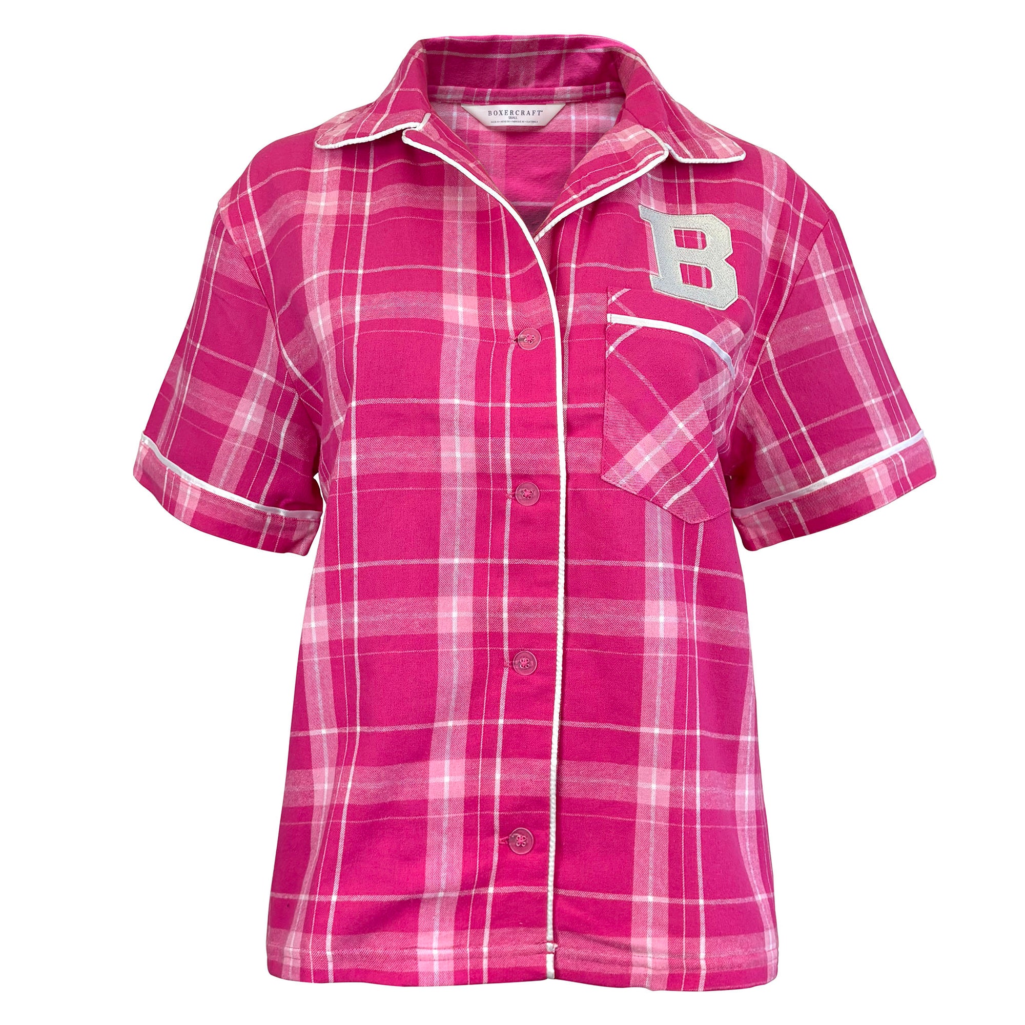 A women's short-sleeve button-front shirt in a pink and white plaid pattern, featuring a collar, white piping, a chest pocket, and a large white block letter 'B' on the left chest.