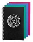 A spiral-bound planner with a black cover featuring a white circular sun emblem and the text 'BOWDOIN COLLEGII SIGILLUM 1794', shown with three other colored notebooks fanned behind it on a white background.