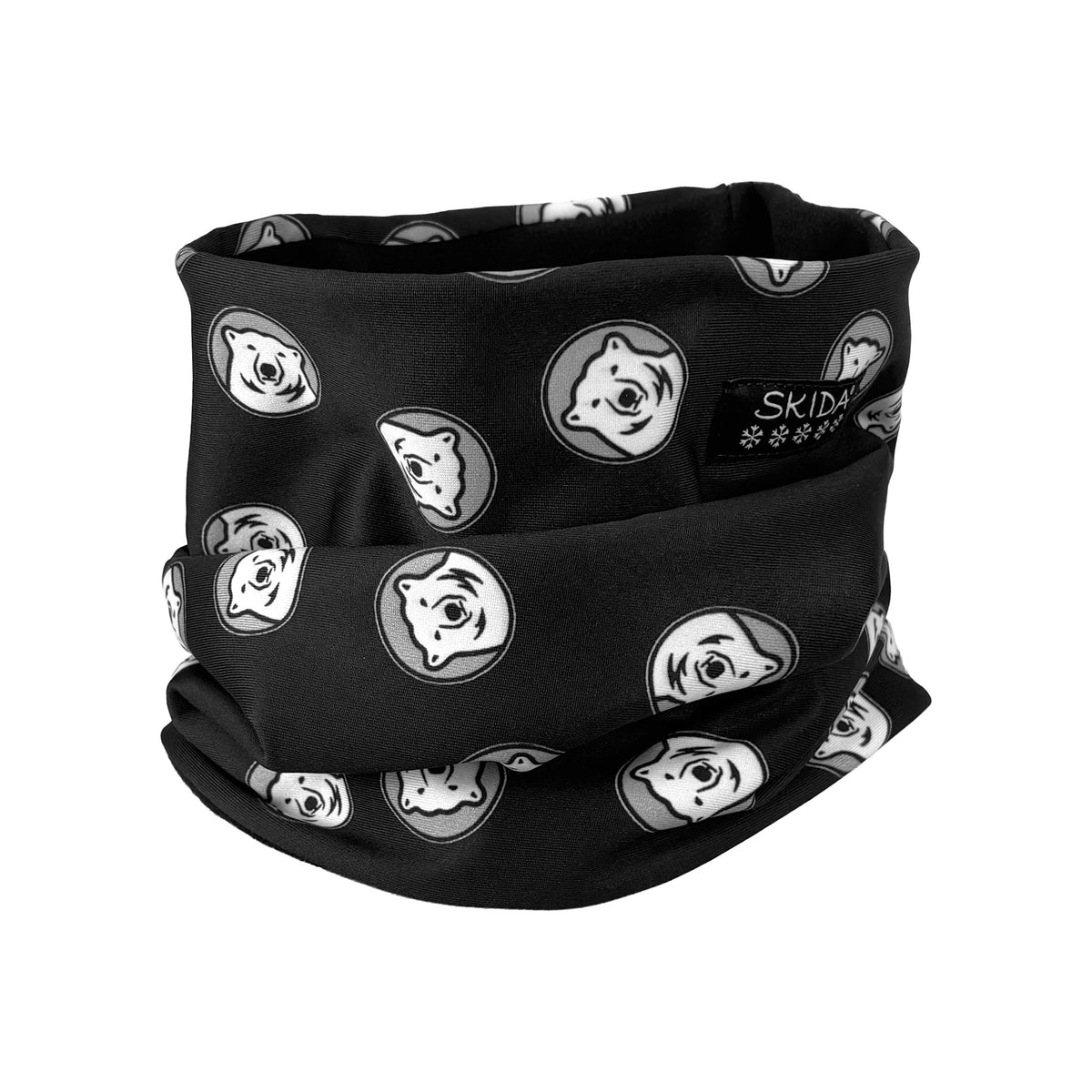 A black neck gaiter featuring a repeating pattern of stylized polar bear faces in white and gray, with a black brand patch on the side reading 'SKIDA'.