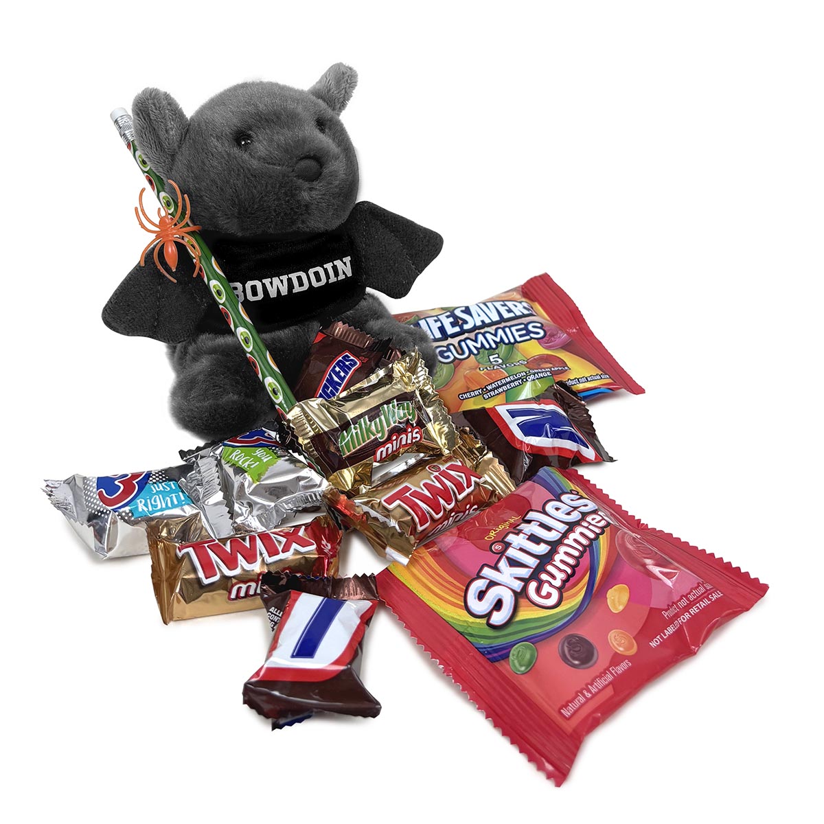 Plush bat with 'Bowdoin' shirt surrounded by candy bars on a white background