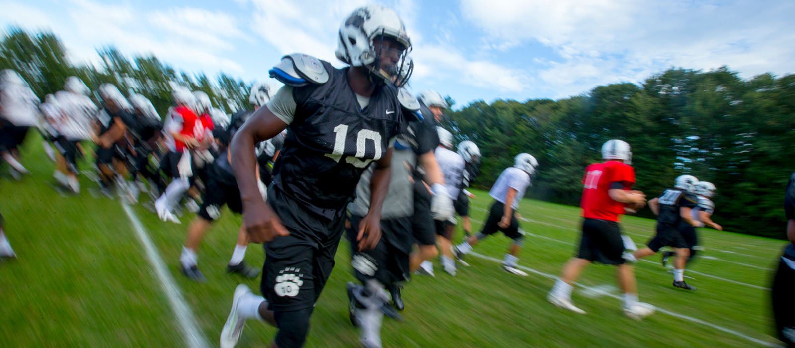 Action shot of a Bowdoin football game.