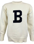 Ivory sweater with black B.