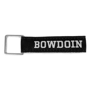 Black nylon strap with square metal ring and black ribbon with BOWDOIN in white athletic logotype.