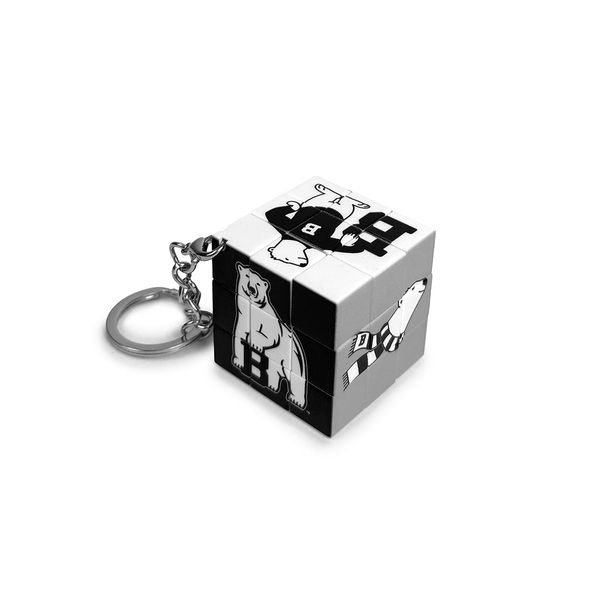 Cube-shaped keychain with bear illustrations on a white background