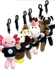 Set of plush keychains with animal designs on a white background