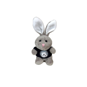 Small, stubby plush grey bunny in black T-shirt decorated with Bowdoin mascot medallion.