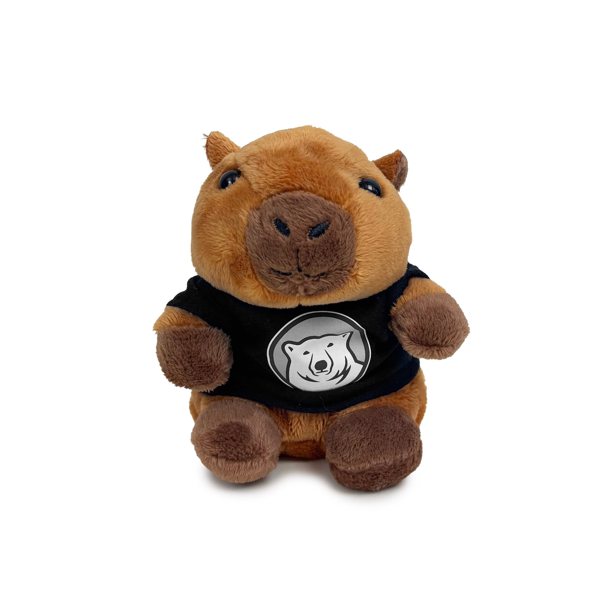 A plush capybara toy wearing a black shirt with a white polar bear logo, photographed against a plain white background.