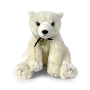 Plush sitting polar bear with black bandanna.