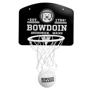 Mini basketball set with black backboard with white and grey imprint of mascot medallion flanked by Est. 1794 over BOWDOIN over Brunswick, Maine. White hoop and net, small white foam ball with black BOWDOIN over COLLEGE imprint.