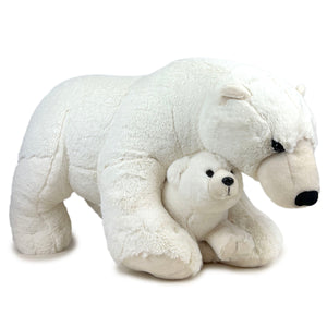 Plush polar bear with another, smaller bear between its front paws.