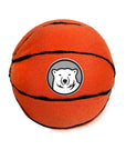 Stuffed basketball with a bear logo on a white background