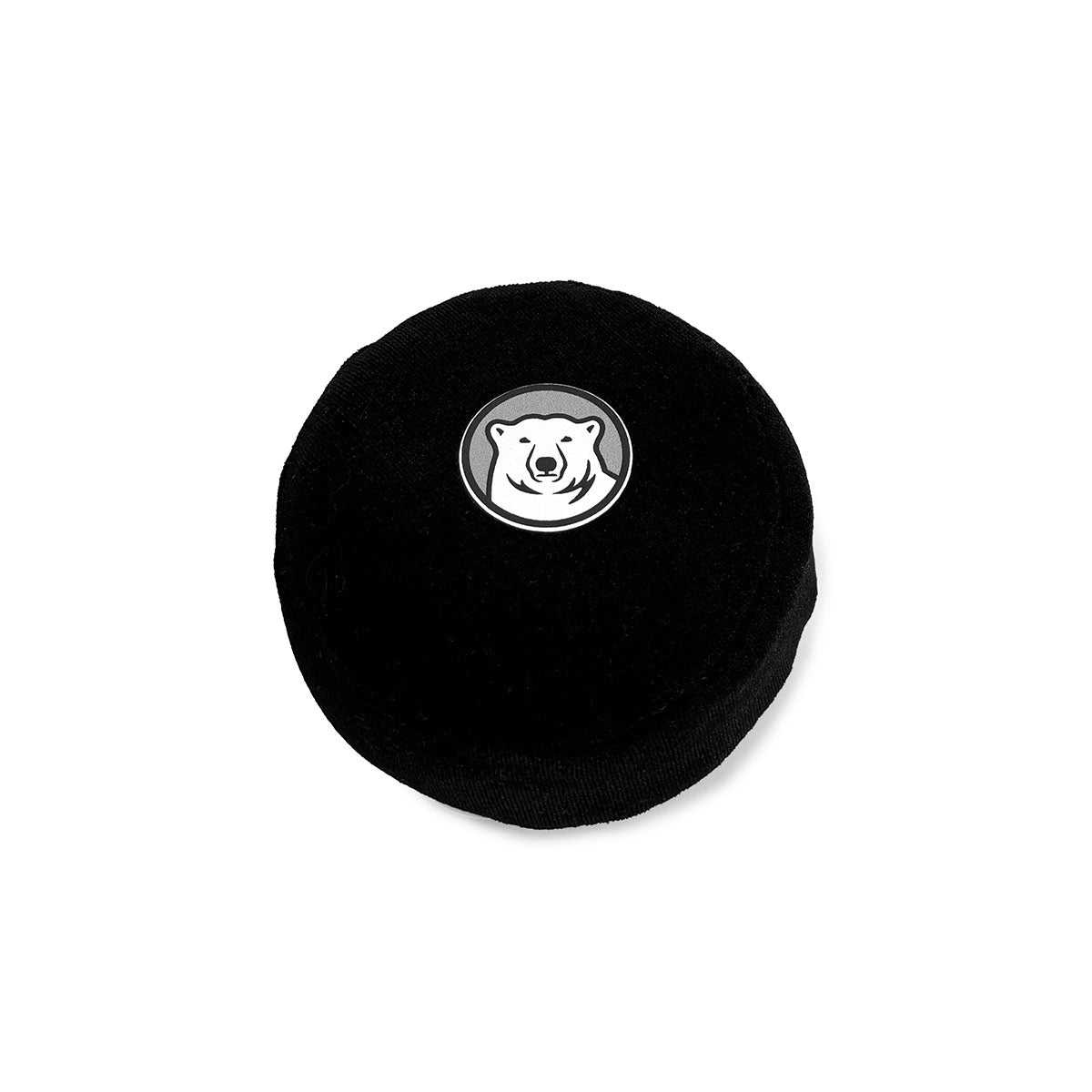 Black stuffed hockey puck with a white bear logo on a white background