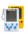 Handheld electronic games with Tetris and Pac-Man branding on a white background