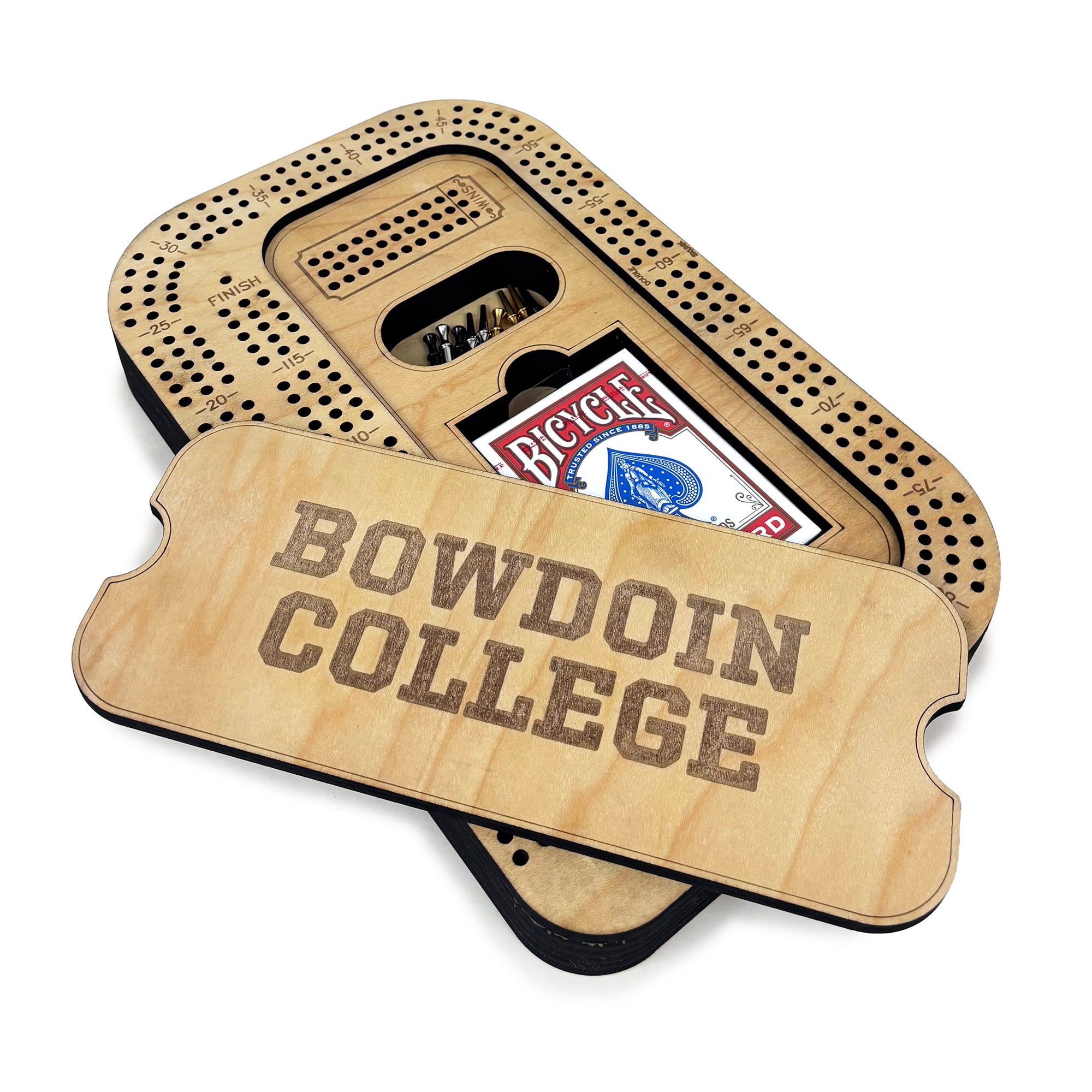 Wooden cribbage board with 'Bowdoin College' engraving and a deck of cards.