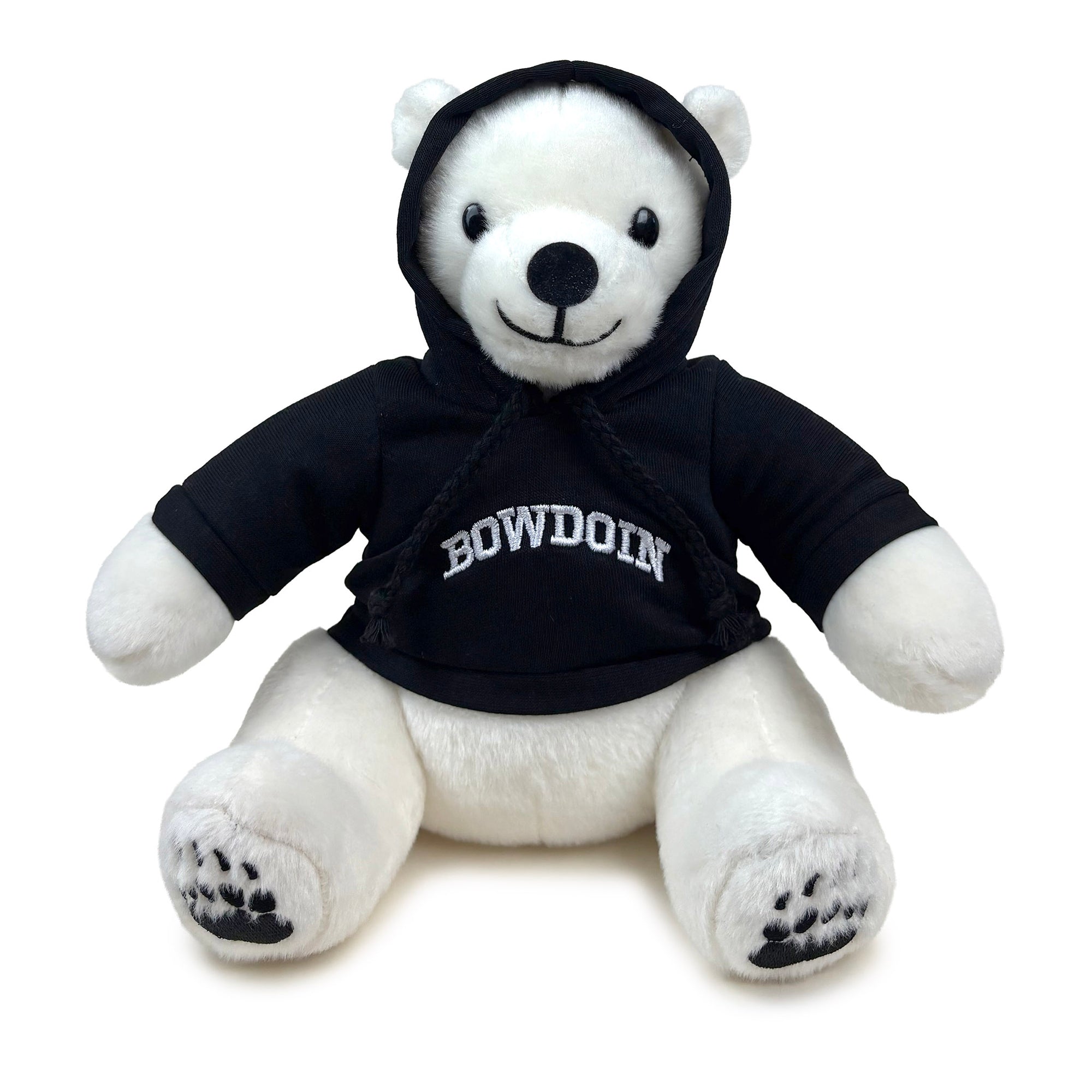 White teddy bear wearing a black hoodie with 'Bowdoin' printed on it against a white background. The hood is pulled up over the bear's head and its ears are sticking out of holes in the hood.