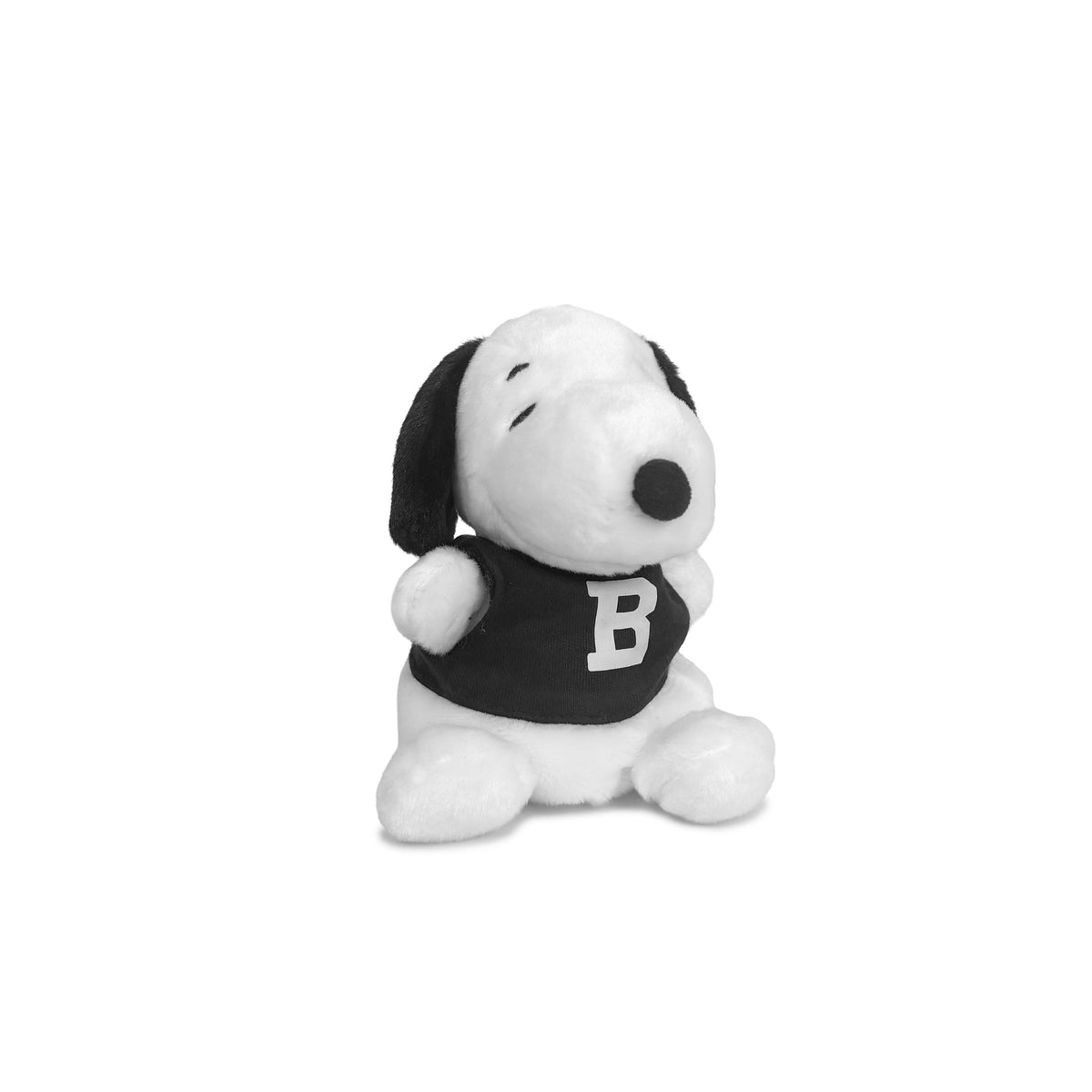 A small plush Snoopy toy wearing a black shirt with a white letter B, photographed against a plain white background.